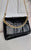 Faux Leather Padded Handbag with Chain Detail